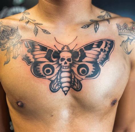 chest moth tattoo|23 Moth Tattoo Meanings: Spiritual, By Body Location。